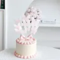 Delicate pink butterfly cake toppers with bow, perfect for dessert table and birthday party. - 10 Pieces Set / Pink Blush