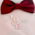 Holographic acrylic LOVE YOU cake topper with velvet bow, perfect for Valentine's Day party. - Iridescent Style (LOVE YOU) / 1.3mm Thickness (Approx 8.7cm Height)