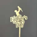 Gold acrylic Father's Day cake topper detail, featuring a loving silhouette and festive typography. - Father's Day Holding Child Silhouette / Width Approx 9CM / Gold