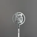 Detail view of silver acrylic Best Dad Ever cake topper for Father's Day party decorations. - Best DAD ever Round Hollow Pick Silver / Width Approx 5CM / Silver