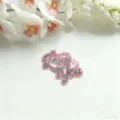 Acrylic cake topper detail view featuring shiny pink Love You design and white orchid. - Mirror Rose Red Glitter Pink Double Layer Love You / Width Approx 7CM