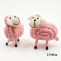 Detailed view of handmade pink wool felt sheep figurine home decor ornament 10x8cm - Pink