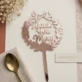 Mother's Day acrylic cake topper detail featuring floral butterfly wreath and elegant rose gold finish. - Rose Gold Marked Butterfly Wreath Thank You Mom