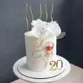 Ins Style Face Line Acrylic Cake Topper with Number 20 and Candles for Party Decor - Holding Wine Glass