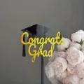 Acrylic graduation cake topper detail with black cap and gold Congrats Grad text! - Large Doctoral Cap Black Gold Double Congrats Grad