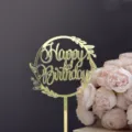 Adorno de pastel de acrilico dorado Feliz Cumpleanos con diseño de corona floral para fiesta. - Happy Birthday Estilo 3 Dorado / Ancho 10cm / 1.3mm Acrílico Dorado