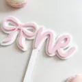 Pink and white acrylic one cake topper with bow for baby birthday party dessert table. - Double Layer Bow 'One' (Style-03) / Pink and White