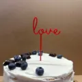 Red acrylic LOVE cake topper detail shot for wonderful dessert table decoration. - Red Love / Approx. 10cm Width