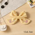 Cotton linen embroidered bow hair clip, cute swan design, elegant hair accessory for women. - Swan Ribbon Knot / Yellow
