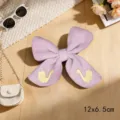 Cotton linen fabric bow hair clip with cute embroidered swan design, stylish hair accessory. - Swan Ribbon Knot / Purple