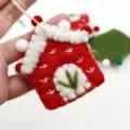 Handmade wool felt Christmas tree hanging house ornament with cute holiday festive design. - Red