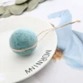 Wool felt ball pendant handmade decoration felt ball ornament close up detail view - Autumn Green