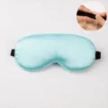 Light blue satin sleep mask with adjustable strap for comfortable sleeping and resting. - Adjustable Elastic / Fresh Green