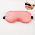Pink double-sided imitation silk sleep mask with adjustable elastic strap and buckle detail. - Watermelon red