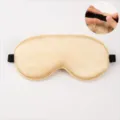 Champagne silk sleep mask with adjustable elastic strap and smooth satin finish for sleeping. - Adjustable Elastic / Champagne
