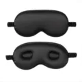 Schwarze 3D Seiden-Schlafmaske, glatte Vorderseite und ergonomische Form für Dunkelheit. - Schwarz
