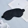 Black double-sided imitation silk sleep mask with elastic band for travel and rest. - Black