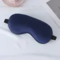Maschera per dormire in seta sintetica blu scuro con cinturino regolabile per oscuramento. - Blu navy