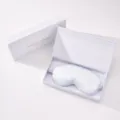 Luxurious silk eye mask in an elegant white gift box, perfect for sleeping and travel. - Gift Box / Fresh Blue