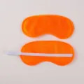 Solid color satin sleep mask breathable blackout eye mask for travel and relaxation. - Orange