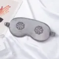Grey silk sleep mask with 3D flower embroidery, breathable and comfortable for travel and home use. - Gray