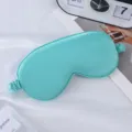 Mint green silk sleep mask with elastic strap, soft breathable shading eye cover for travel. - Green