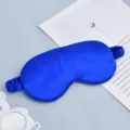 Blue silk sleep mask with soft elastic strap for comfortable traveling and sleeping rest. - Sapphire Blue