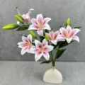 Detailed close-up of artificial lily bouquet with white ceramic vase for home decor - Size 6