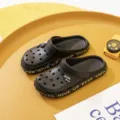 Comfortable black couple garden shoes with letter prints and cute charms, ideal for beach wear. - Black
