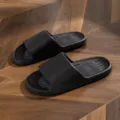 Black couple home slippers, soft foam flat slides with cute bear design and home text. - Black