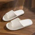 White EVA slide slippers, comfortable indoor home footwear with textured non-slip design. - 36-37 / White