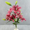 Close-up detail of 6-head artificial lily bouquet with vibrant dark pink petals and green leaves. - No. 22