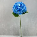 Artificial blue hydrangea single stem with leaves in glass vase for home wedding decor setup. - Lake Blue