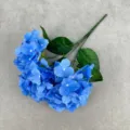 Detailed view of blue artificial hydrangea flower branches with realistic green leaves for decor. - Dark Blue