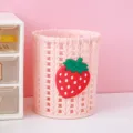 Cute pink woven pen holder with strawberry decor, ideal for desktop stationery and brush storage. - Strawberry