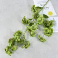 Detailed view of artificial flower branch decoration, ideal for home display and photo props. - Green