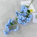Blue artificial flower branch detail shot, elegant home decoration and photo prop for styling. - Light Blue