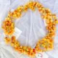 Guirnalda de vid de flores amarillas artificiales para decoracion de bodas y fiestas. - Naranja
