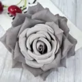 Close-up of a grey artificial velvet rose flower head, perfect for wedding and event decor. - Gray