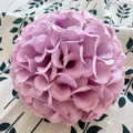 Close-up detail of purple artificial flower ball made from silk fabric for crafts and decor. - Light Purple