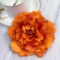 Close-up van de textuur details van kunstmatige oranje pioenroos bloemblaadjes decor - Oranje