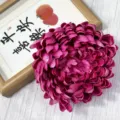 Close-up detail view of vibrant magenta artificial chrysanthemum flower head for home decor. - Dark Rose Red