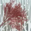 Detailed view of red artificial frost plant branch, perfect for wedding and home decor. - Burgundy
