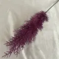 Purple artificial pine needle branch fake plant flower detail for home room interior decor. - Fuschia