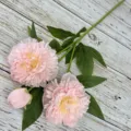 Artificial silk peony flower stem with pink blooms and green leaves for home decoration. - Light Pink