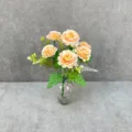 Artificial peony flower bouquet detail view with transparent glass vase for home decor setup. - Champagne