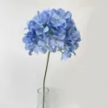 Close-up detail of artificial blue hydrangea flower stem, elegant floral decor accessory. - Light Blue