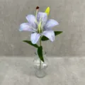 Detail view of 3D printed artificial lily flower in glass vase for home and wedding decor. - Grey Blue