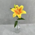 Detailed close-up view of a 3D printed artificial yellow lily flower displayed in a clear glass vase. - Light Orange