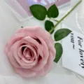 Single artificial pink rose with green stem and leaves, perfect for home decor and wedding arrangement. - Dusty Pink